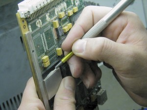 Coating removal from circuit board