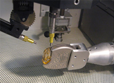Comco Automated MicroBlasting system cleaning pacemaker