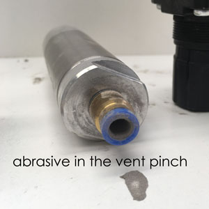 damaged vent pinch- abrasive contamination